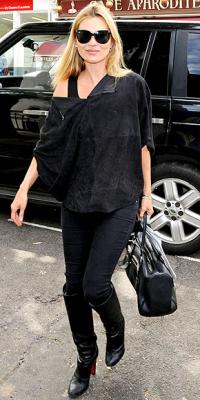 Kate Moss y sus botas altas...